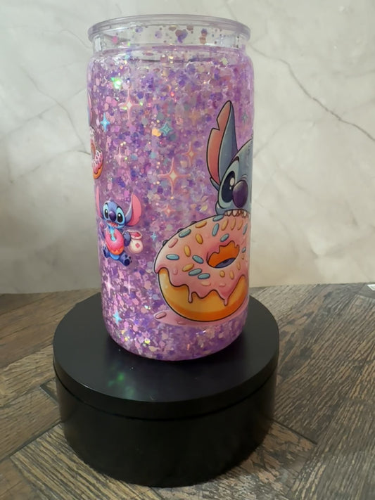 Stitch with a donut snow globe